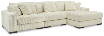 Lindyn 3-Piece Sectional RHF Chaise with Ottoman in Ivory