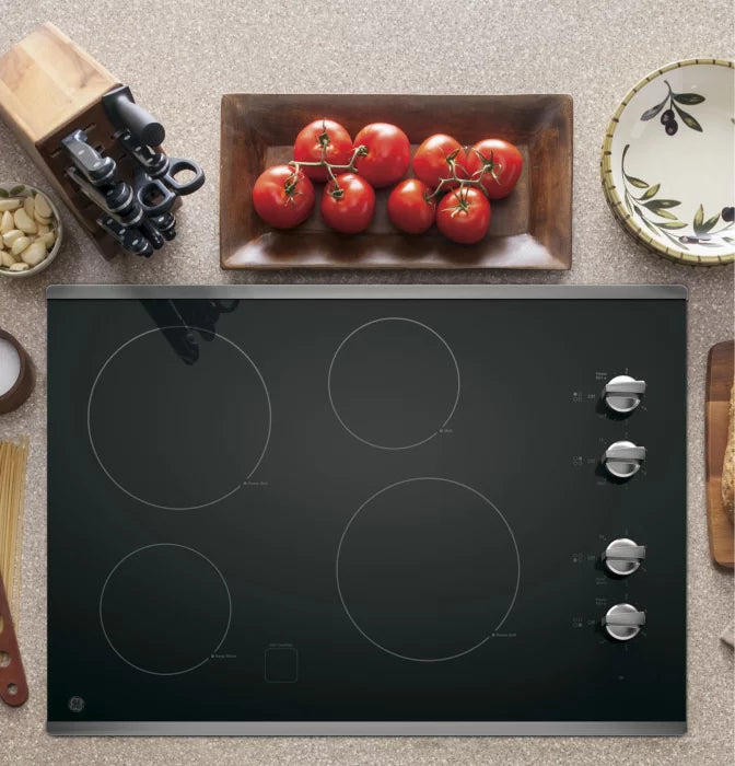 GE JP3030SWSS 30" Built-In Knob Control Electric Cooktop in Stainless Steel on Black